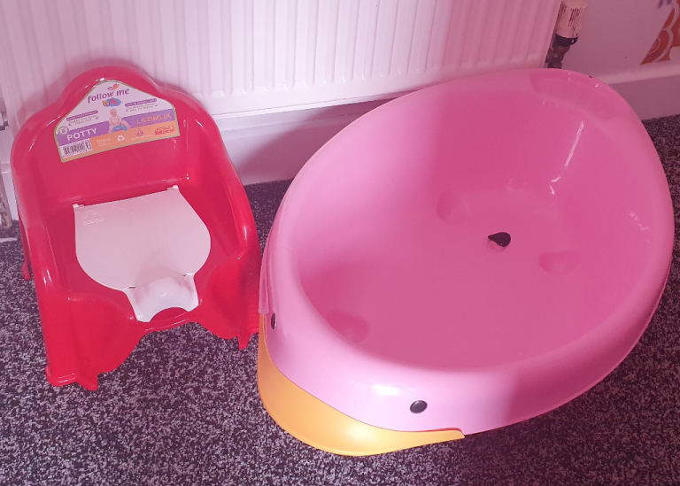 baby girls pink duck bath tub with red potty