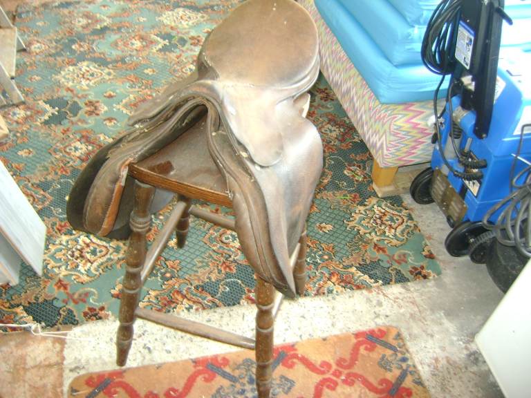 TWO SADDLE HIGH CHAIRS