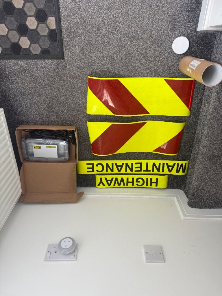 Highway maintenance light and magnetic strips