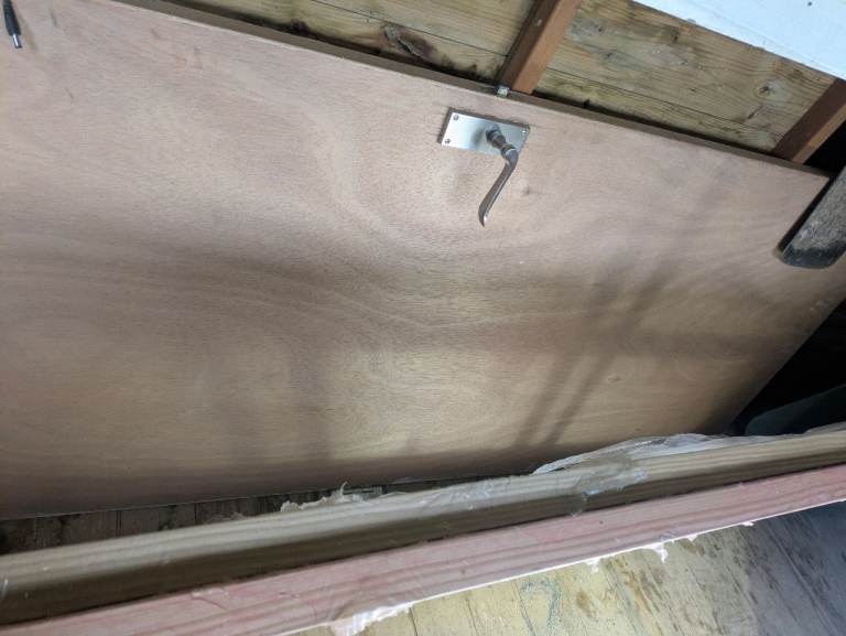 Internal fire door complete with hinges and handle