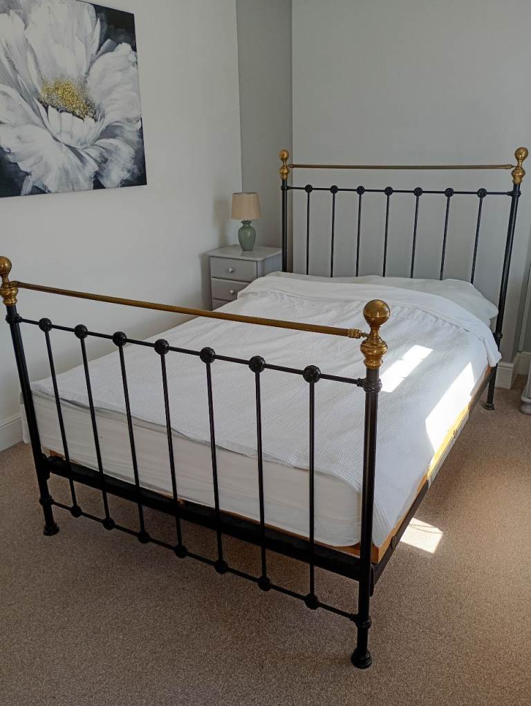 DOUBLE METAL BED AS SHOWN IN PHOTOGRAPHS.  (could assist with free local delivery) 