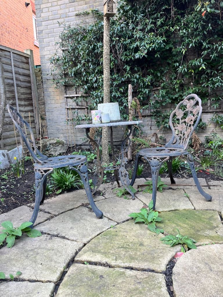 Cast iron table and chairs