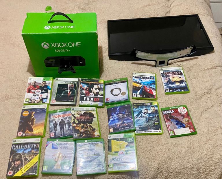 Xbox one with games and TV.