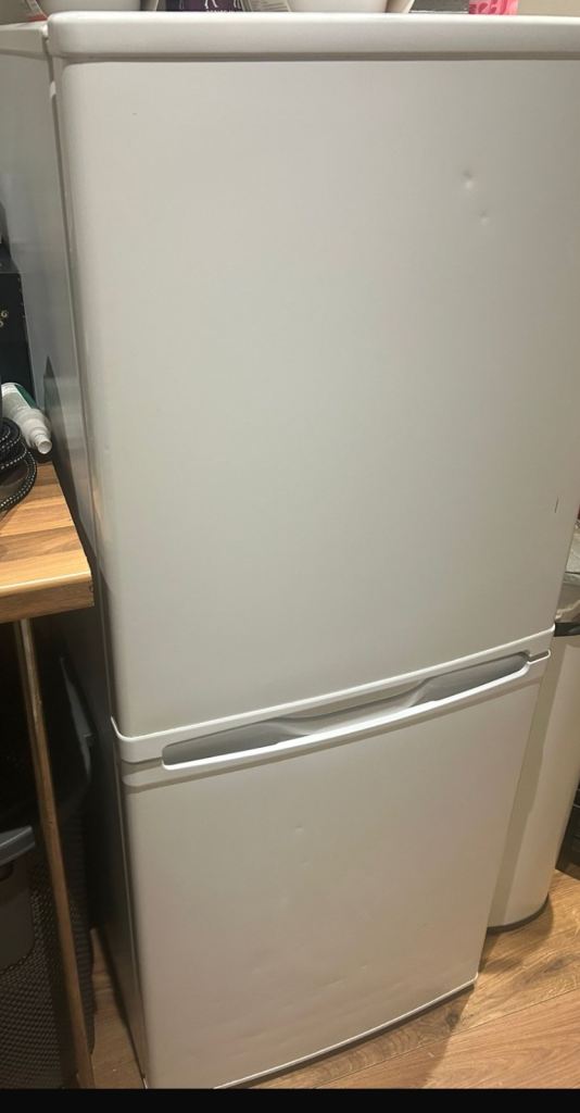 White fridge freezer in perfect working condition