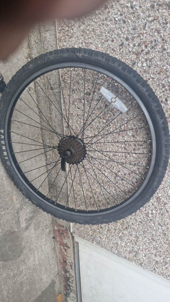 26" Back tire and parts of bike