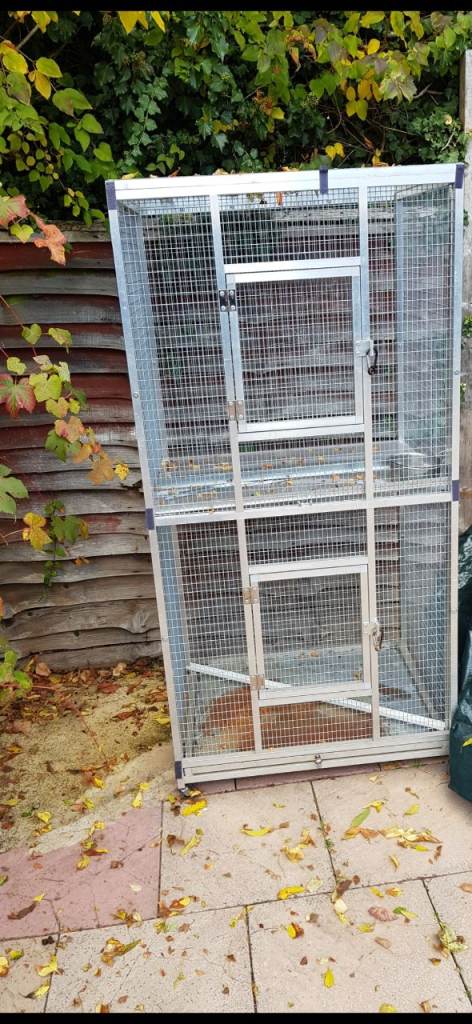 Sold ......Aluminuim Aviary with swing feeders