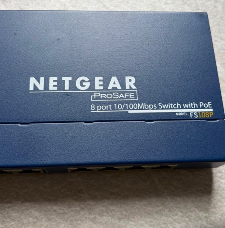 Netgear ProSafe FS108P 8 Port 10/100 Switch with 4 Port PoE – Working – No PSU