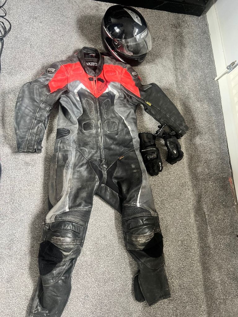 Motorcycle leather suit gloves and helmet