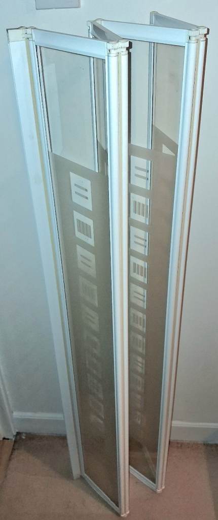 White bifold bath shower screen