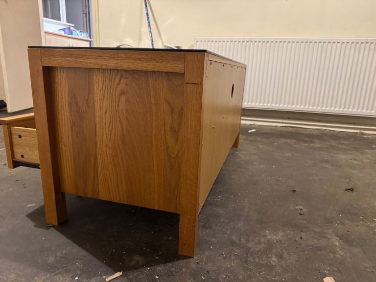 Wooden tv unit with glass top