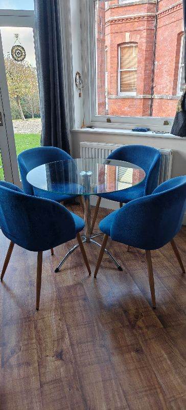 Glass Dining Table with 4 Blue Velvet Chairs – Good Condition