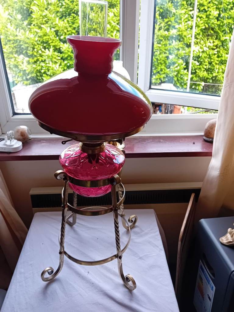 Vintage Red Glass Oil Lamp on Brass Stand – Good Condition, one leg broken at foot stands OK
