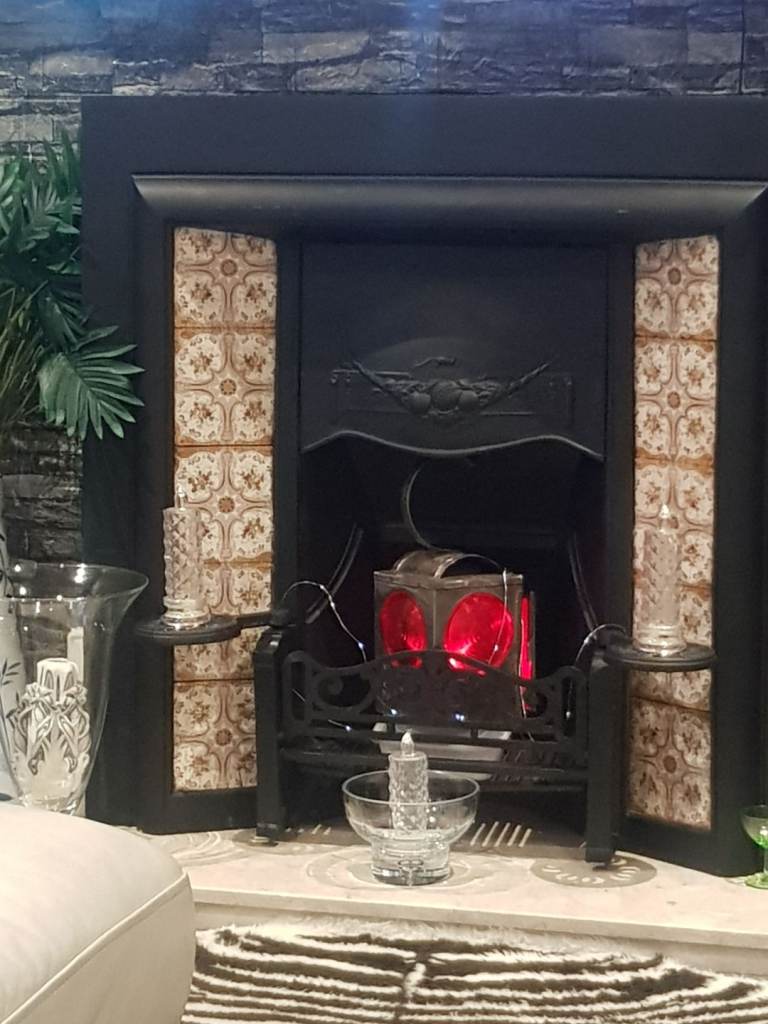 Victorian tiled cast iron fire place