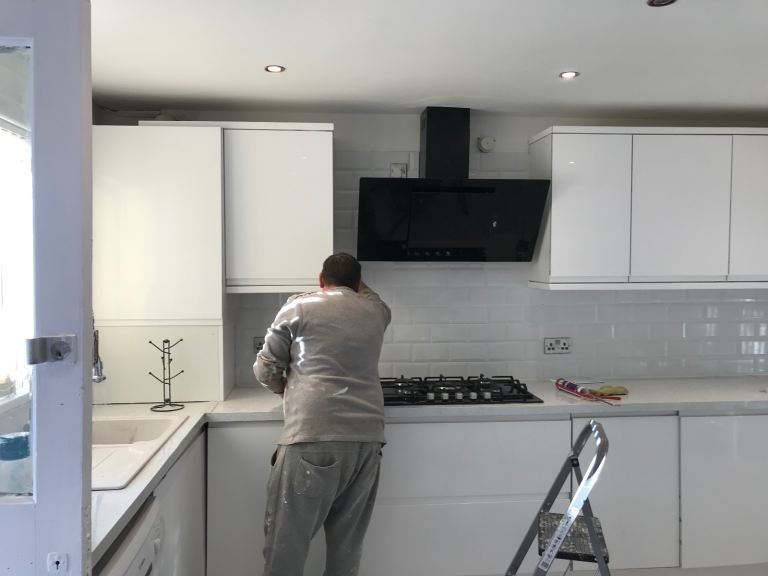Kitchen fitters . Tilers . Bathroom fitters , plasterers 