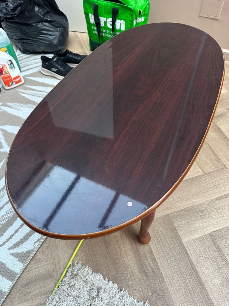 Brown wooden coffee table - used - few scratches but still in good condition 