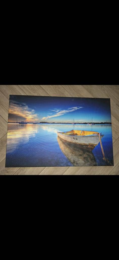 Blue boat and sea canvas picture