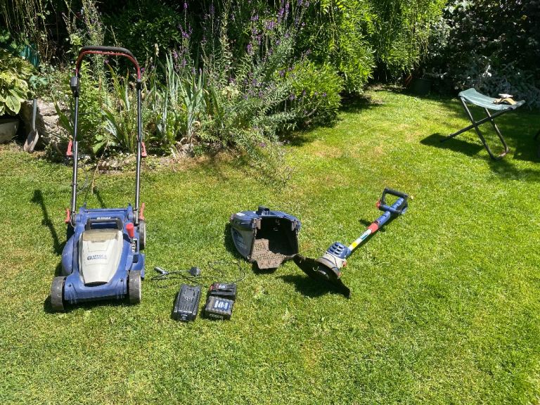 REDUCED PRICE Spear&Jackson cordless 34cm mower and 25cm trimmer, with 2 batteries and charger