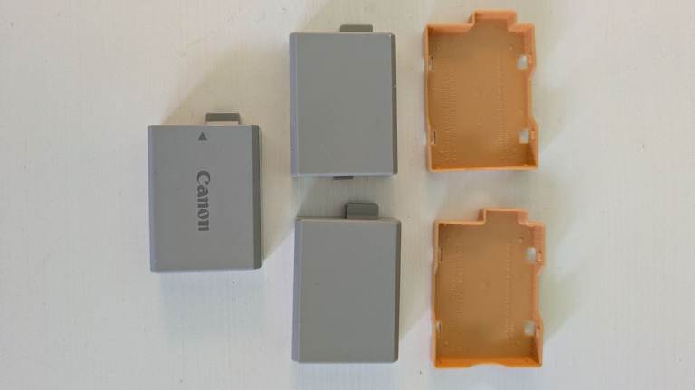 LP-E5 Camera Batteries with Cases – Good Condition