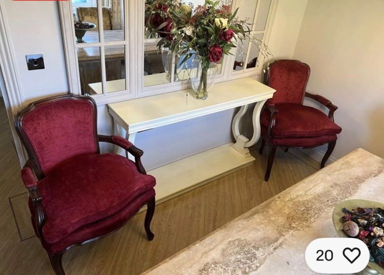 A pair of Armchairs in dark red in excellent condition 