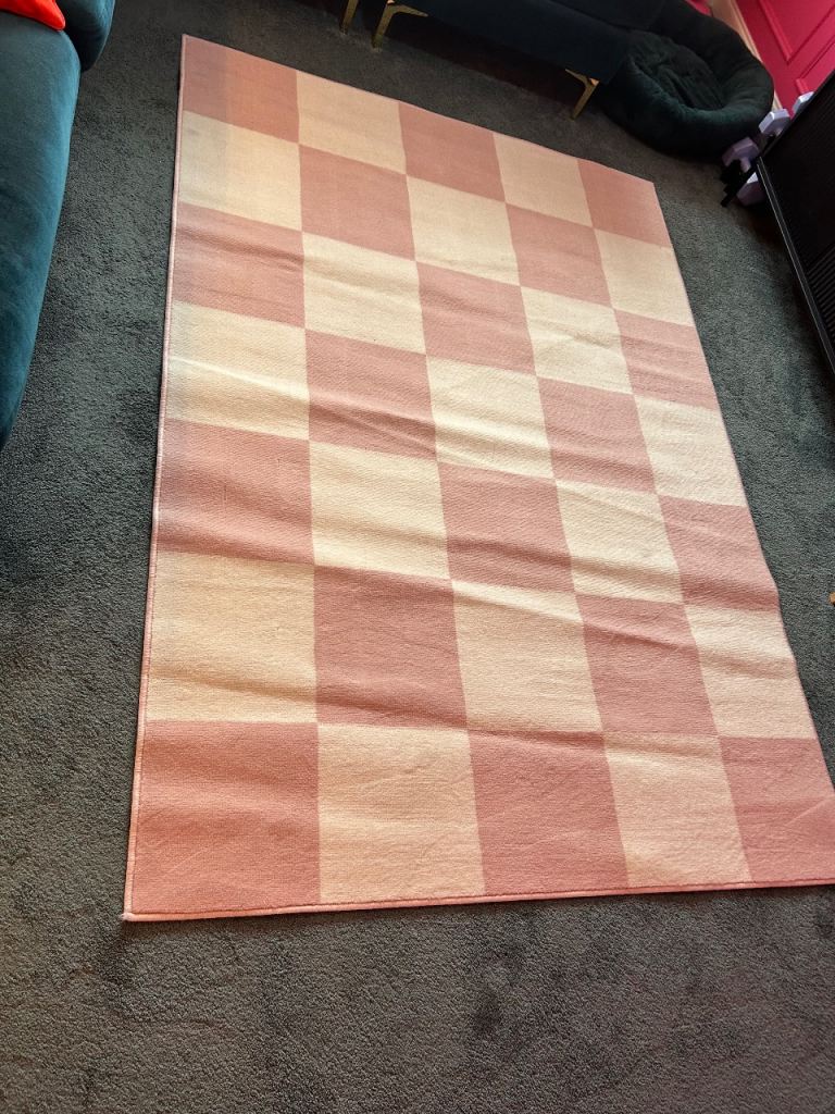 Pink and white rug 