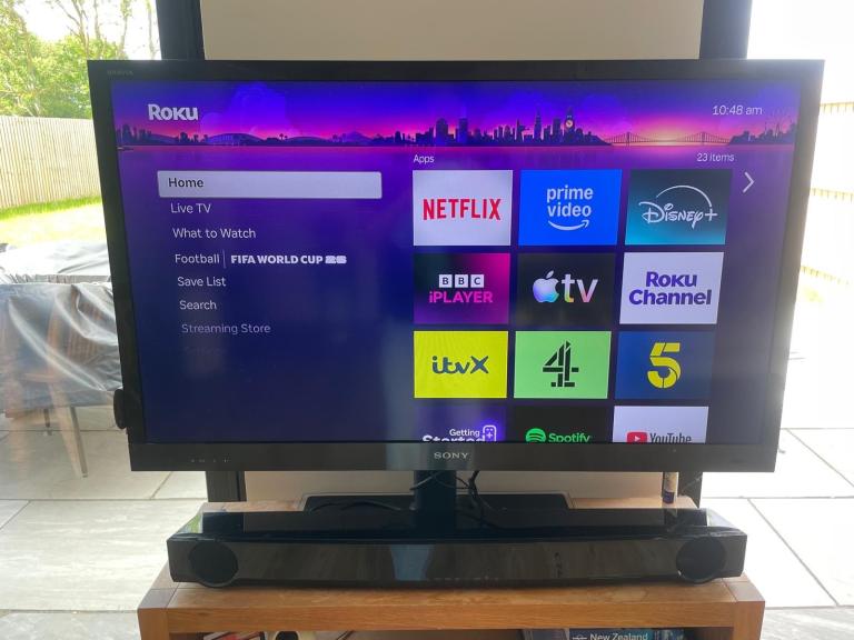 Sony LCD TV 42 inch + Roku stick and remote + soundbar