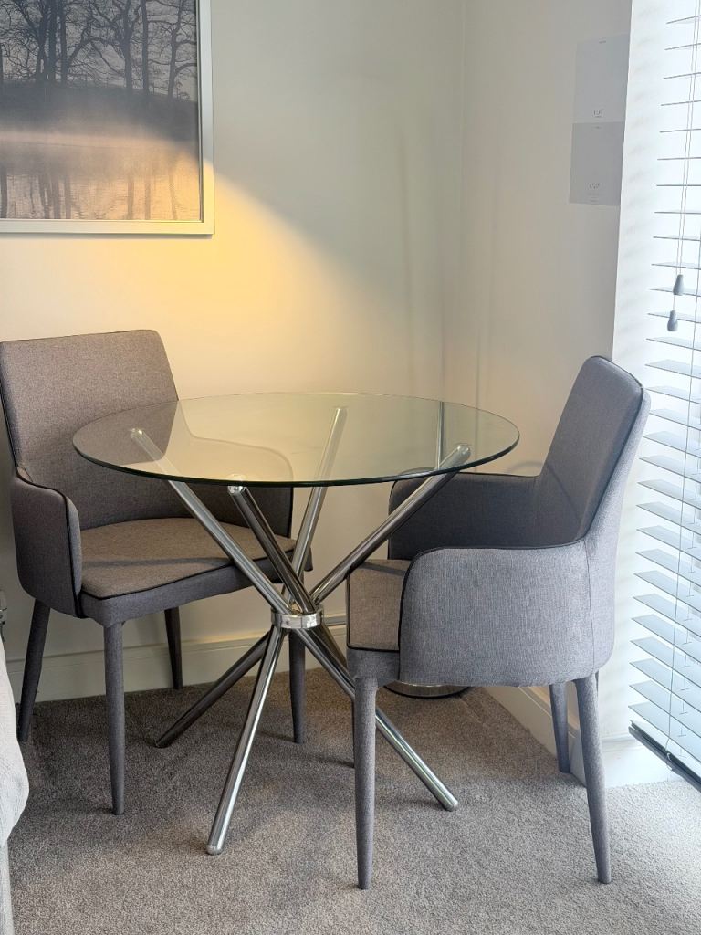 Glass Top Dining Table with Two Grey Chairs – Good Condition