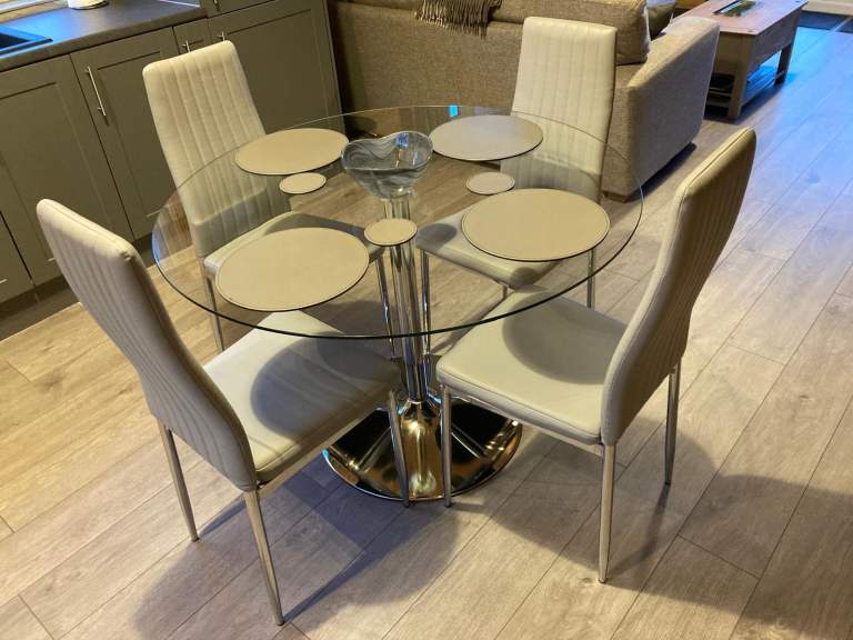 GLASS DINNING TABLE AND 5 CHAIRS