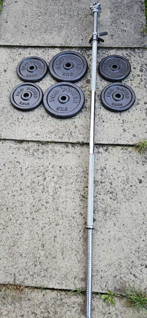 Cast Iron weights plus 5ft Bar