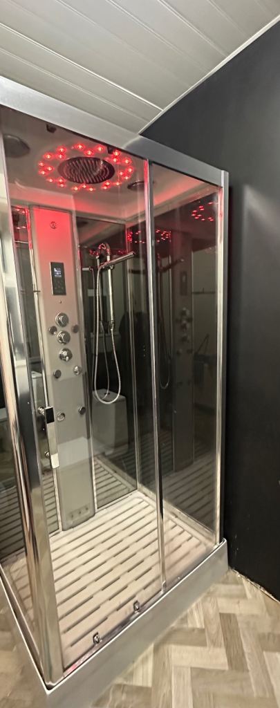Insignia steam shower unit with Bluetooth speakers 