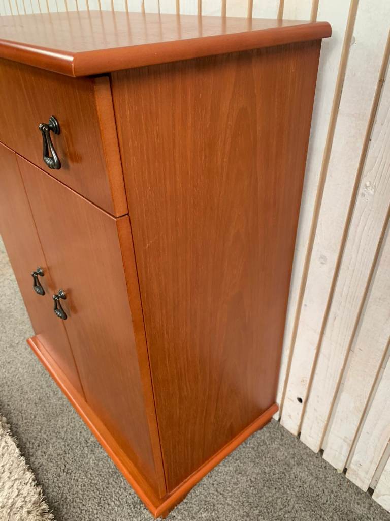 Cupboard with 1 Drawer and 2 Doors Brown wood .