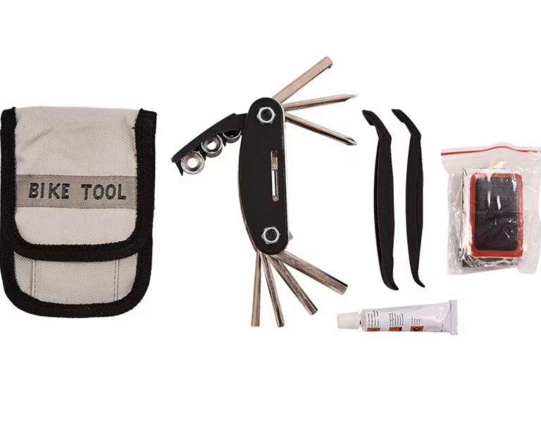 Includes multi-tool, tyre levers, patch kit, and pouch.