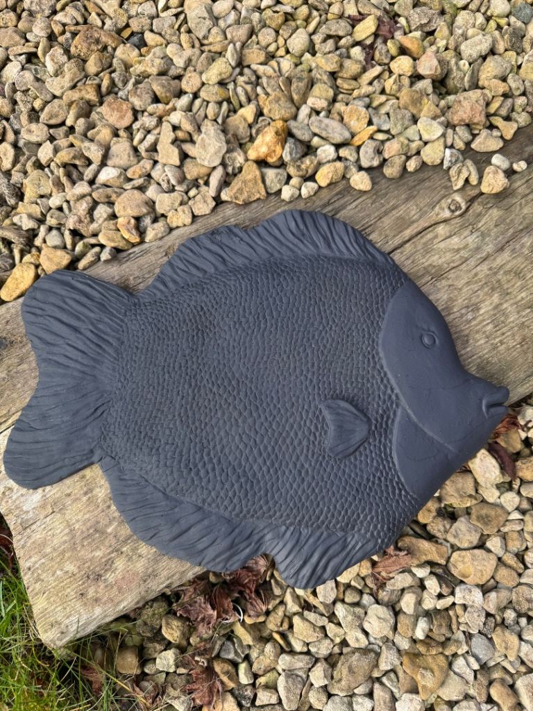 Grey stone fish plaque 