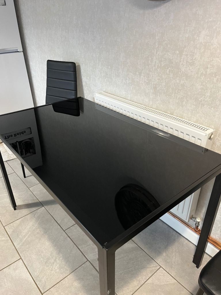 Black glass dining table 