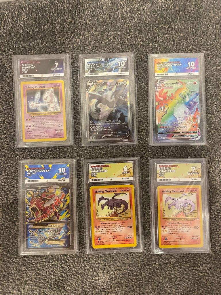 Pokemon TCG graded ACE cards shining charizards and mewtwo 