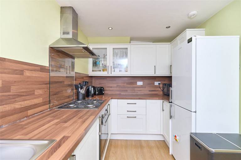 Spacious end-terrace home with large converted loft space & private driveway