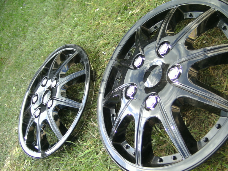 2 , BRAND NEW,BLACK,14 INCH WHEEL TRIMS,WITH RETAINING RINGS,LABELS STILL ON THEM,