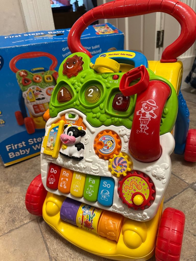 VTech Baby First Steps Walker, a 2-in-1 activity center and push-along walker