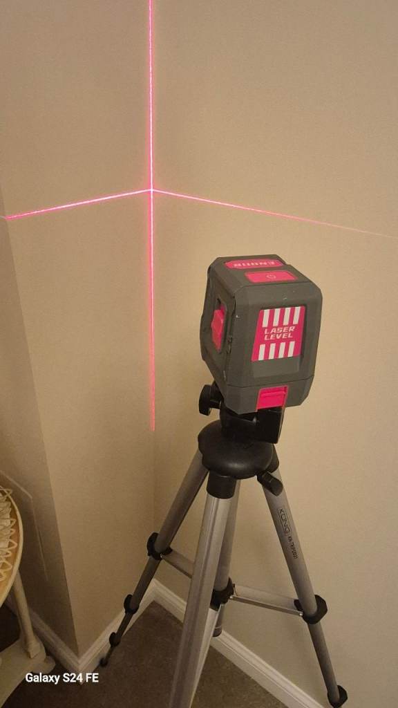 Laser and tri-pod brand new 
