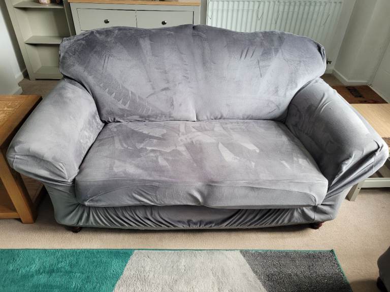 Grey Two-Seater Sofa with Removable Cover – Good Condition