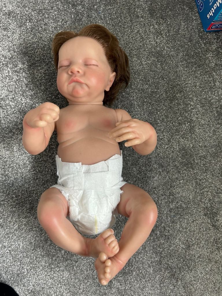 Realistic Reborn Baby Doll with Clothing Bundle