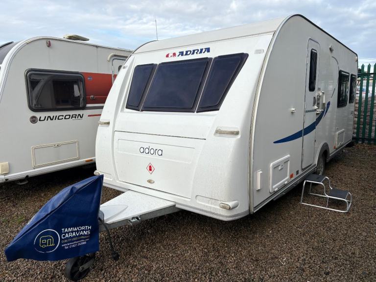 ADRIA ADORA 542DL - FIXED SINGLE BEDS + END WASHROOM + MOTORMOVER