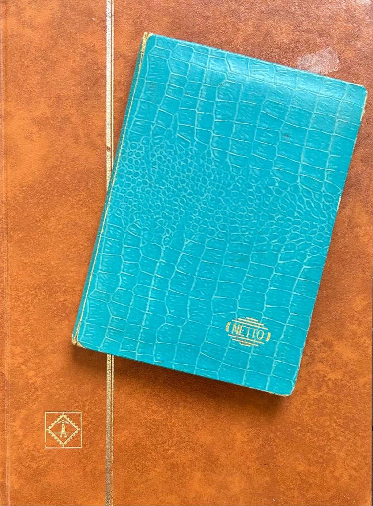 Pair of empty vintage stamp albums 