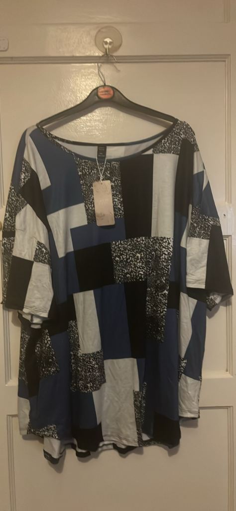 patchwork design tunic from the brand Emery Rose m