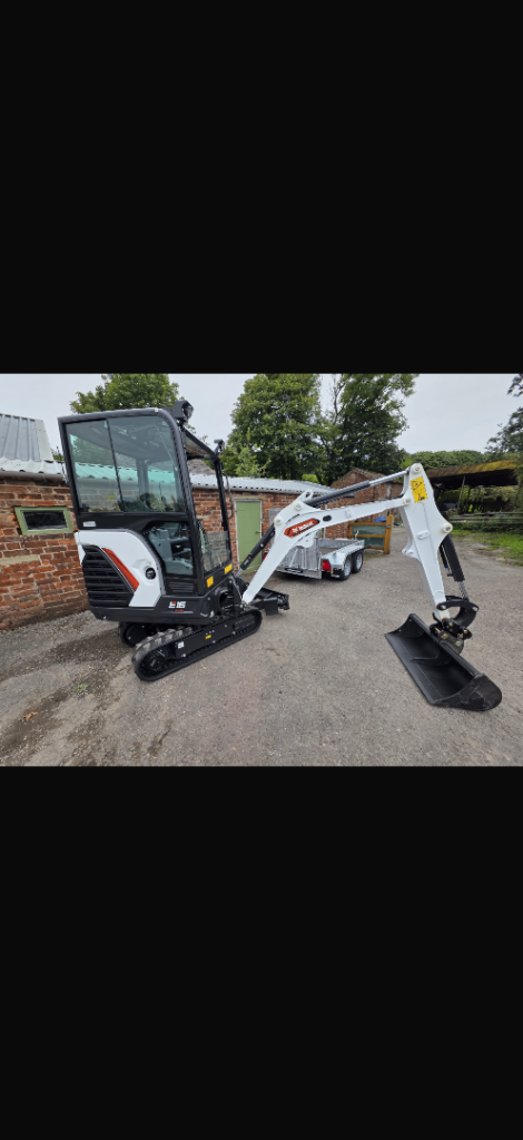Mini Digger and operator 