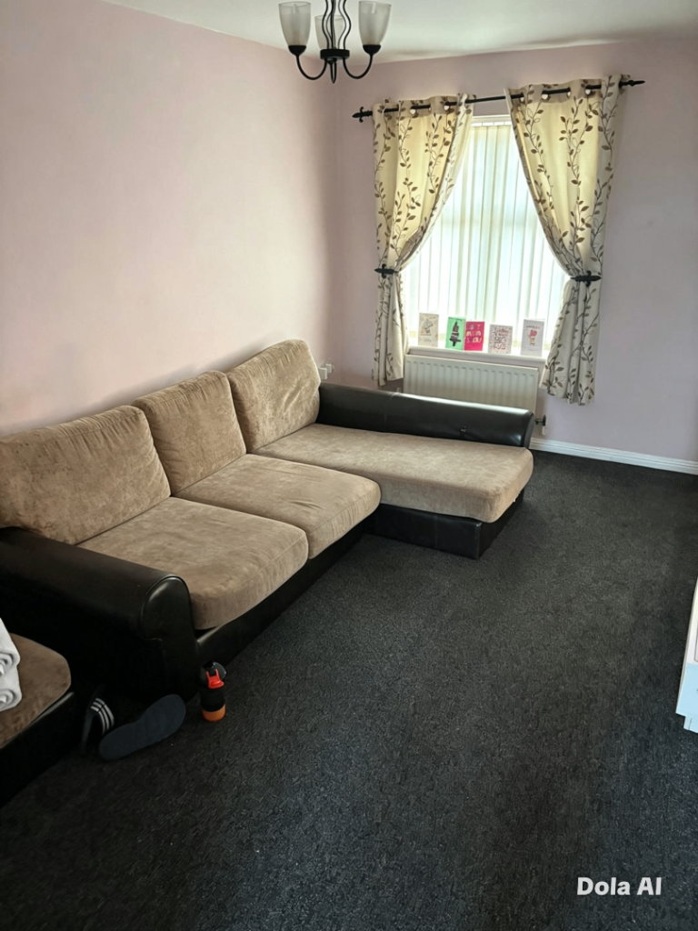 Beige L shaped sofa with matching pouffe plenty of use left in this pet/smoke free home 