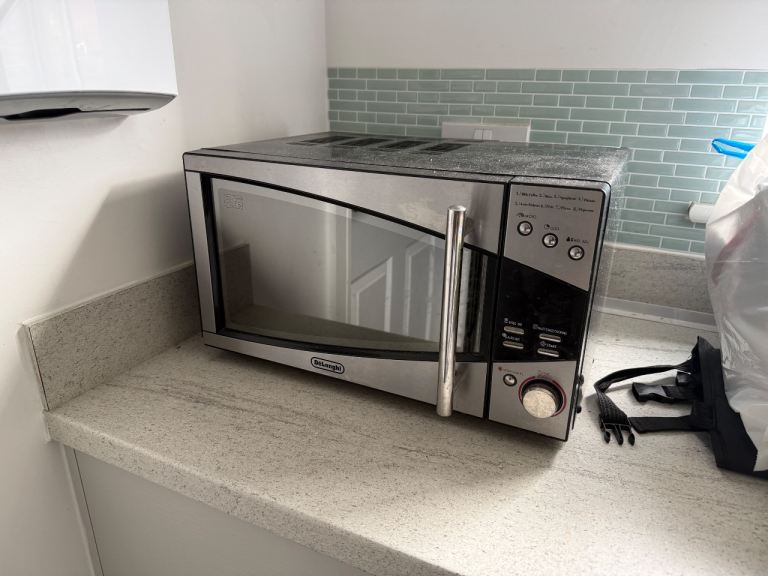 DeLonghi Microwave Oven - Silver, Good Condition