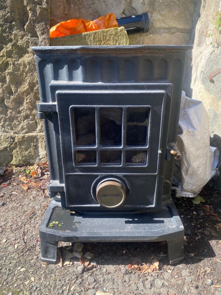 Multi-fuel cast iron stove needing refurbished