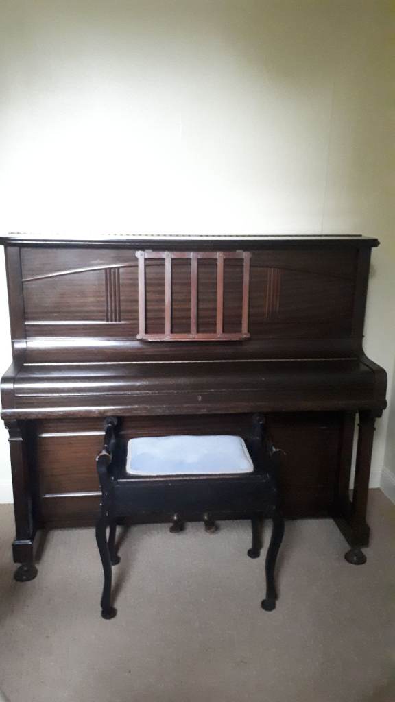 Upright piano and stool