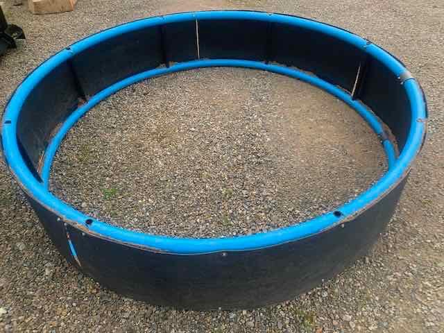 Horse feed ring (plastic & lightweight ) or large Rabbit/Guinea pig run for the grass. Alford.