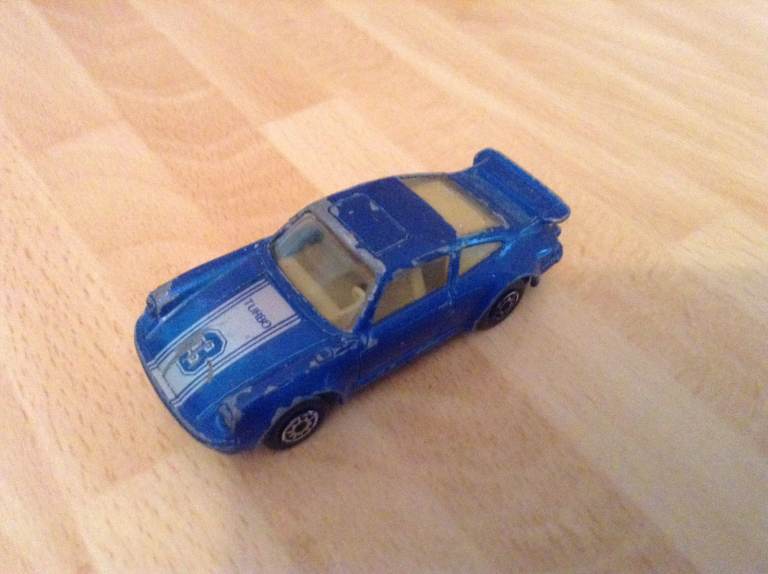 An MC Toy Blue Porsche 911 Turbo
